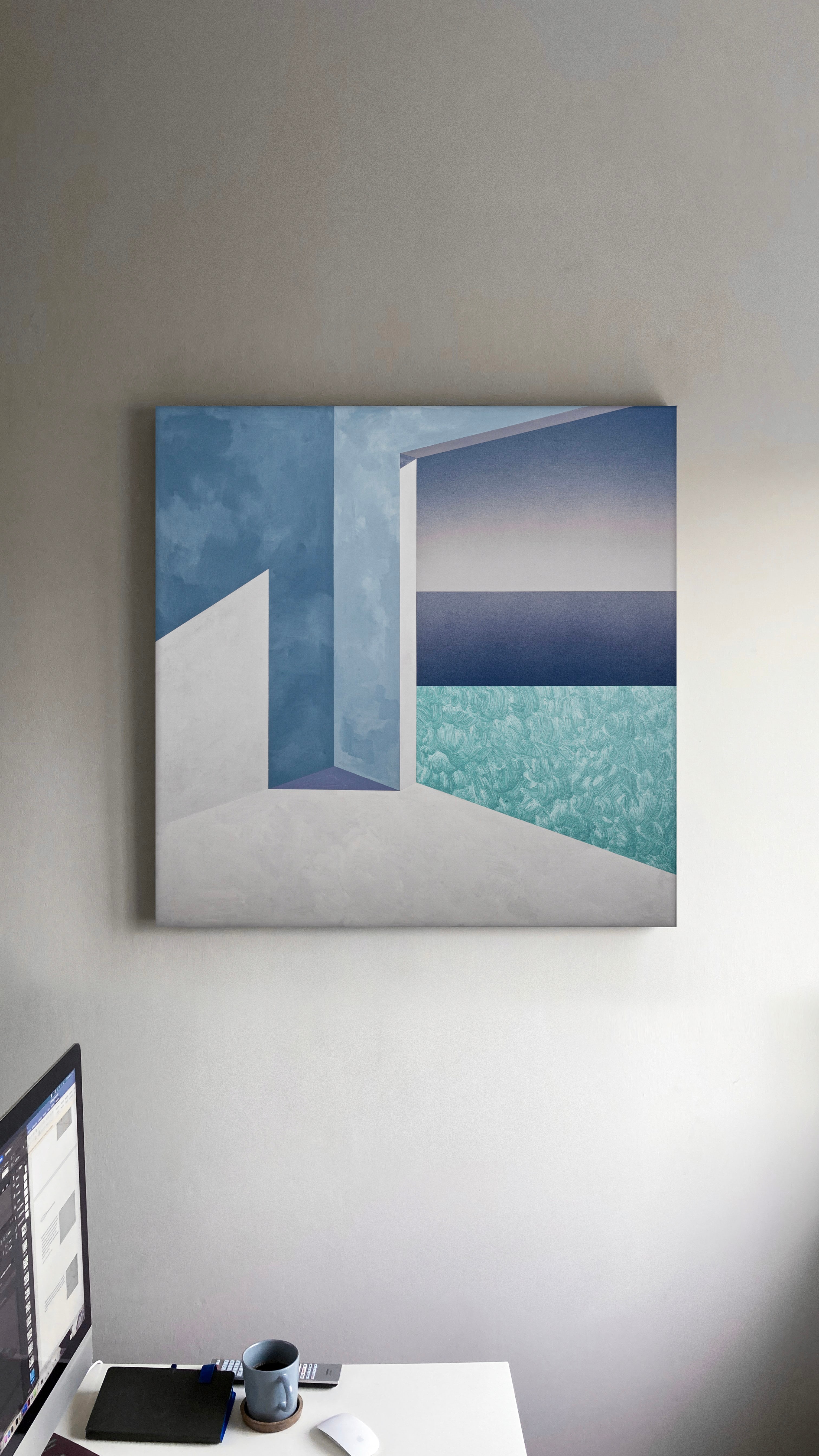 Painting by Ufuk Yılmaz of a pale blue architectural opening onto the sea, hanging above a desk